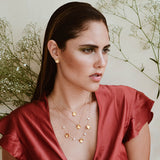 Aretes mini pétalos dorados